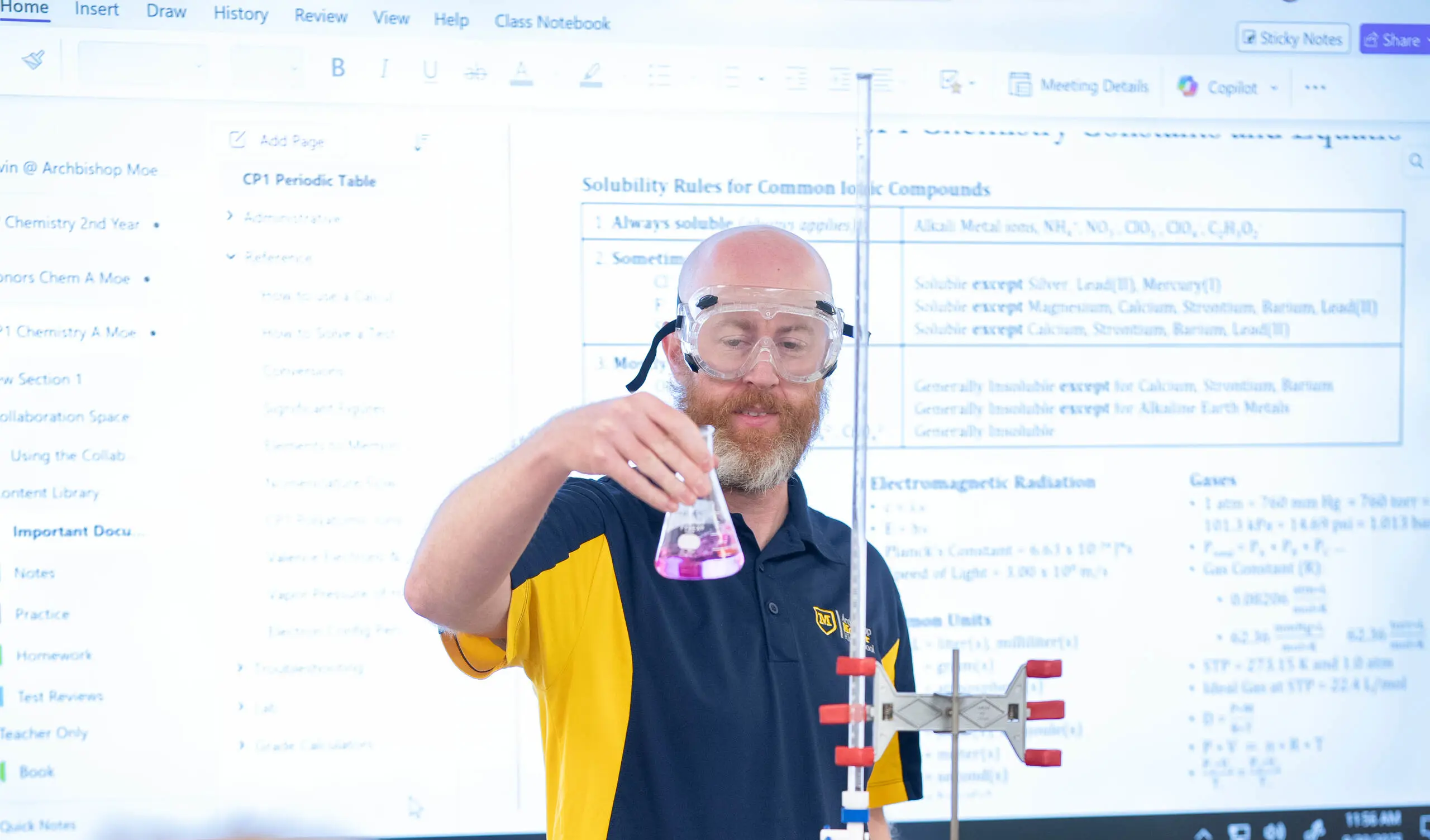 Science teacher performing experiment